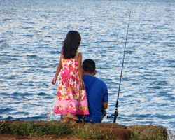 Father and Daughter Fishing in Hawaii