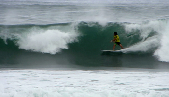 Kaito Ohashi prepares to launch into a floater at the 2013 Reef Hawaiian Pro, Vans Triple Crown of Surfing