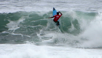 Marco Fernandez prepares to snap off the lip at the 2013 Reef Hawaiian Pro, Vans Triple Crown of Surfing
