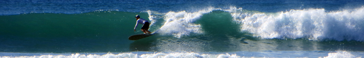 Longboarder Surfing in Hawaii at Hau Bush in Ewa Beach