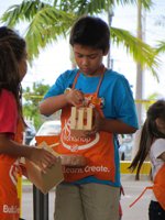 Painting the Project at the Home Depot Kids Workshop